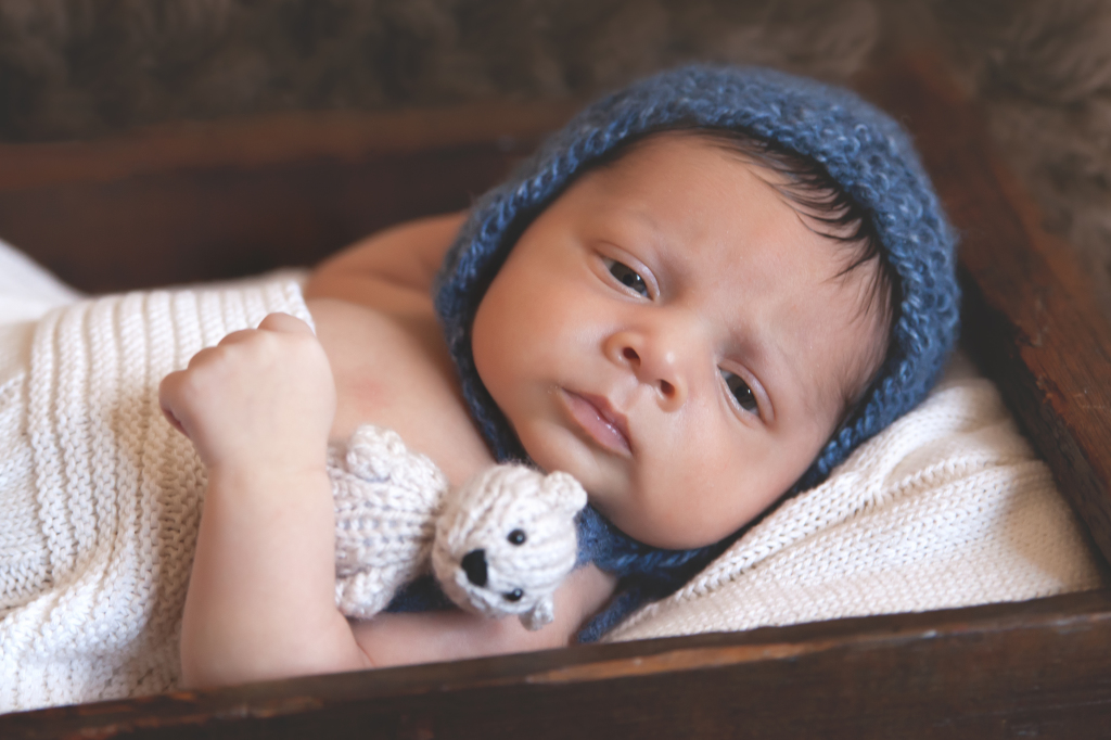 so cute cuddling with his bear