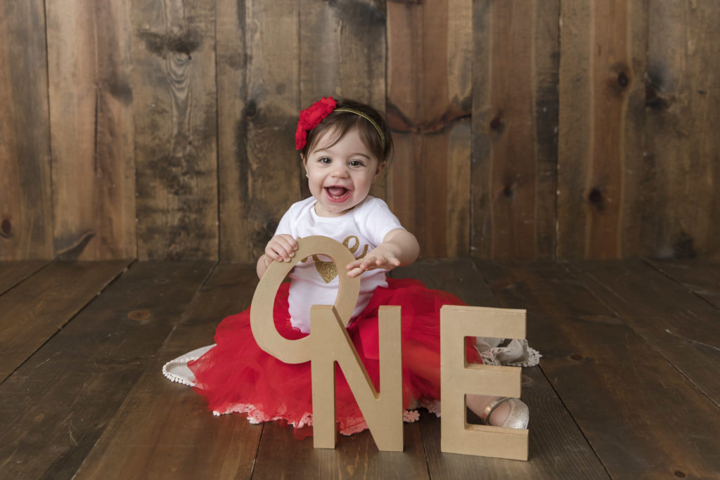 First Birthday photo with the letters O N E